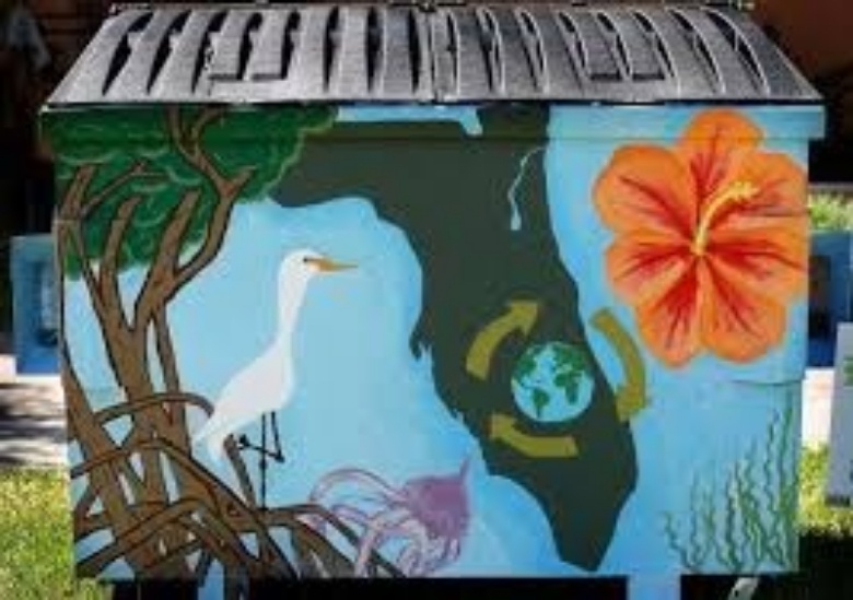 dumpster with recycling mural