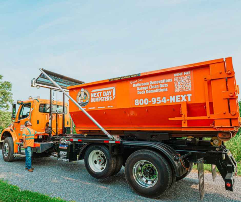 Dropping off a roll-off dumpster for a contractor
