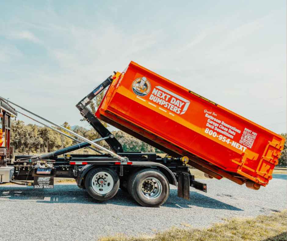 Large roll-off dumpster for roof work